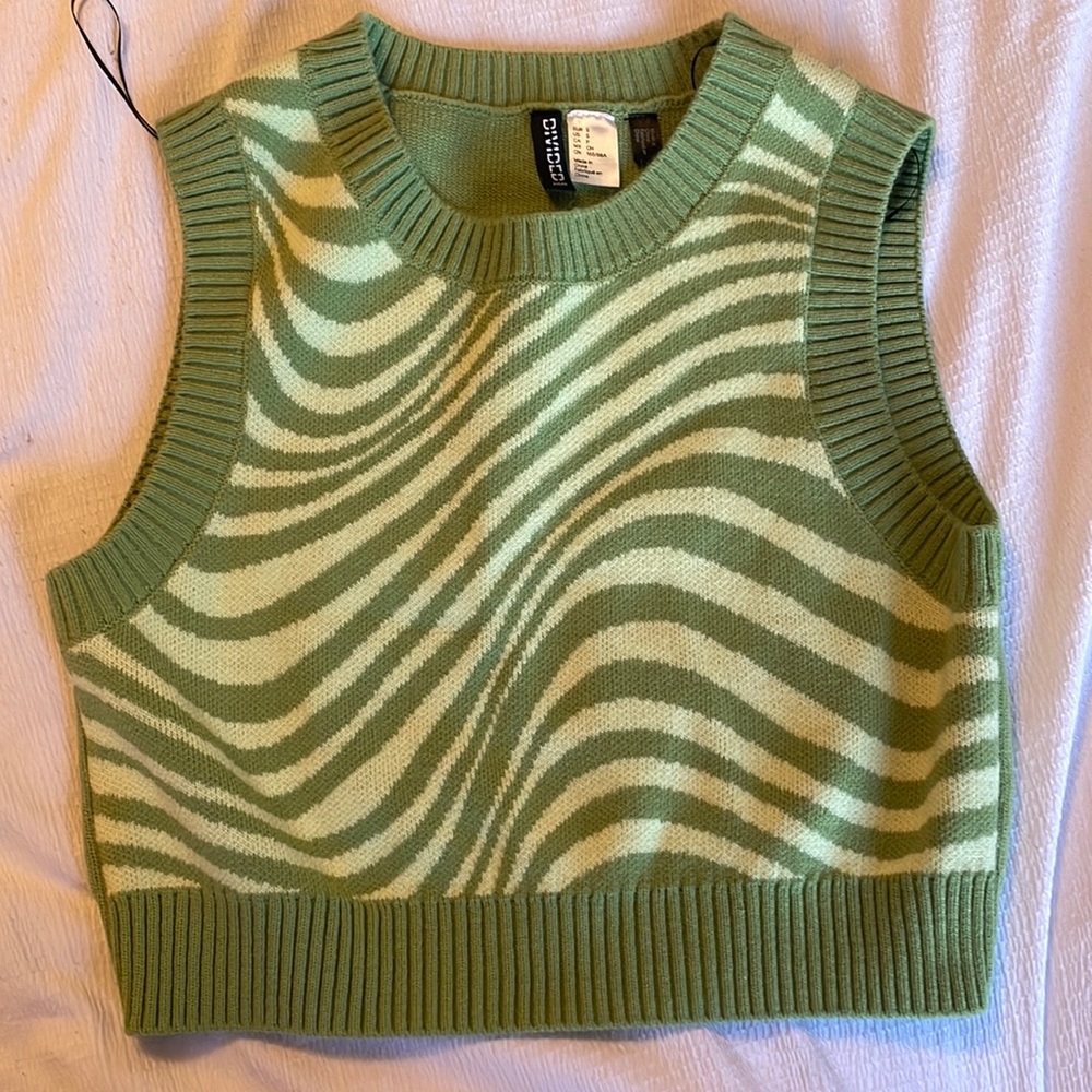 Green sweater vest